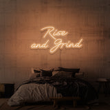 "RISE AND GRIND" NEON SKILT