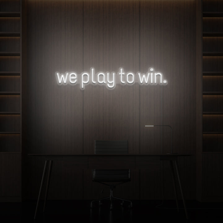 "WE PLAY TO WIN." NEON SKILT